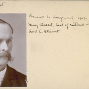 Studio portrait of Frank P. Stewart, owner of a confectionery store and a resident of Georgetown (Clear Creek County), Colorado. He wears a dark corduroy jacket, an upright, round collar and a tie with a stickpin. He has a full, waxed mustache, is balding and his hair is combed back and parted on the side.