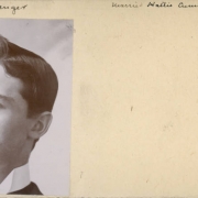 Studio portrait of Fred Sprenger, a railroad employee in Denver (and possibly before that Georgetown, Clear Creek County), Colorado. He wears a shirt with an upstanding collar. He has a full, waxed mustache  and his hair is combed up in a cowlick and parted on the side.