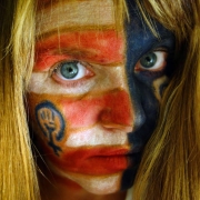 Dana Vaughn-Kivengen portrait wearing face makeup. 