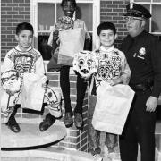 From left to right: Adolph Ayon, Violette Grate, Kennth Montoya,  and Patrolman Jack Martin. October 27, 1967. Photo by Howard Brock. Rocky Mountain News Photograph Collection