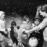 Goblins given a warm reception by Mrs. Robert Fiori. October 31, 1966. Photo by Mel Schieltz. Rocky Mountain News Photograph Collection