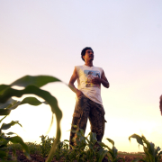 Unidentified migrant workers who have benefited from the help offered by Denver Archdiocese's Sister Molly Mu–oz (CQ), and the Centro Juan Diego, stands in a corn field outside of Ft. Lupton June 14, 2005. Sister Molly "La hermanita," (the little sister) 