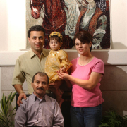 Thorton, Colo., January 27, 2004- Handrin Ismail (top left) with his daughter Valla Ismail (top center) wife, Bayan Ismail, and father Salah Ismail (bottom in chair). All are from Erbil, Kurdistan in northern Iraq.