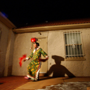 (Denver, CO., February 9, 2005) Bearing the cold a very nervous Tayuan Lee, 37, of Denver practices the dance he was to perform inside the Denver Buddhist Cultural Society, Tuesday night Wednesday early morning Chinese New Year celebration in Denver.