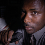 Kidane Teklu, an Ethiopian immigrant, poses for a portrait after his radio show at KLTT studios in Denver, Colo., Sunday, Aug. 7, 2005. Teklu moved to the United States 10 years ago, but is able to connect with his Ethiopian heritage through his radio