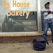 Migrant worker Baltazar Garcia (CQ), a Chihuahua, Mexico native, waits to board the Limousine Express to Albuquerque, New Mexico in Pueblo, Colorado Thursday August 4, 2005. Garcia who is a lettuce and cabbage picker travels yearly by bus from El Centro, 