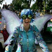 Karrie Fryhover (cq), a member of sQream , Scooter Queers Riding Everywhere and More, a Gay and Lesbian Scooter Club based in Denver, gets ready to to drive her scooter in PrideFest Sunday July 18, 2006