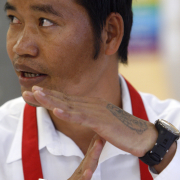 34 year-old Thaw Dah Win asks for a break during a class at the Emily Griffith Opportunity School in Denver. 