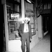 Leroy Smith in front of his Rhythm Records and Sporting Goods Store