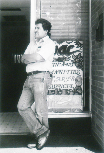 Carlos stands outside Chicano Humanities and Arts Council 1993
