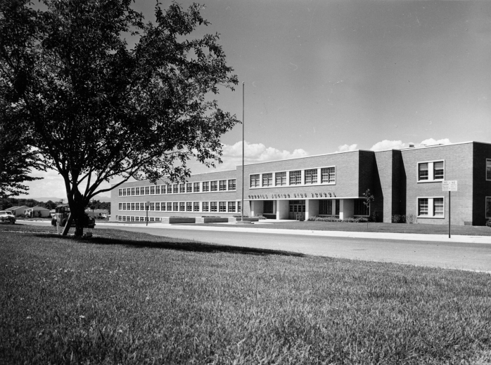 View of Merrill Junior High School at 1551 South Monroe Street in the Cory-Merrill neighborhood of Denver, Colorado, circa 1955-1960, X-28491, https://digital.denverlibrary.org/nodes/view/1092580