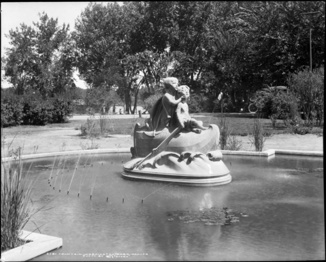 A front view of Wynken, Blynken and Nod marble fountain statue in Washington Park, Denver, Colorado (donated by Mr. and Mrs. Frank L. Woodward, designed by sculptor Mabel Landrum Torrey in 1919)