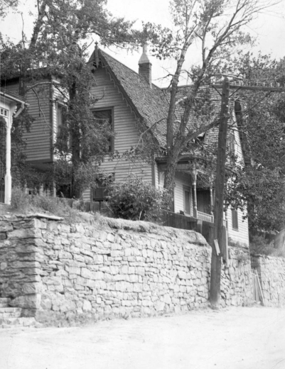 The Sabin home, located on Casey Avenue in Central City, Colorado, is built above a masonry wall, through which there is a gate and steps leading to the house. The Gothic Revival house, which is partially obscured by several trees, is a simple, two story clapboard building with a  peaked roof, shingles, a chimney, and gingerbread bargeboard around its eaves. It has rectangular windows and a front porch.