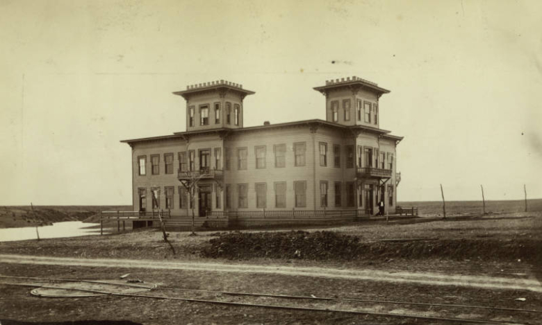 View of the Grand View Hotel at West 17th (Seventeenth) Avenue and Federal Boulevard in Denver, Colorado. A canal from Sloan's Lake is nearby.