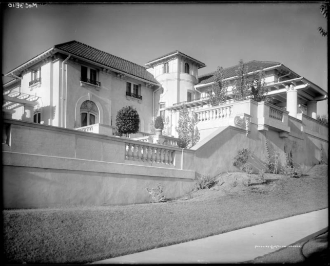 The Helen Bonfils residence at 707 Washington Street, Denver, Colorado; features tile roof, lunette windows, formal terraced gardens, balustraded balconies and pergolas.