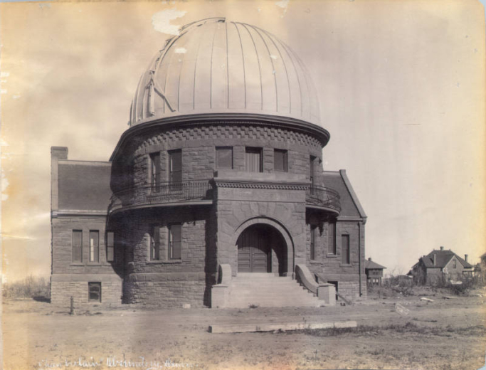 View of the Chamberlin Observatory at Fillmore Street and Warren Avenue in Denver, Colorado. Shows Richardson Romanesque building designed by Robert S. Roeschlaub with observatory dome.