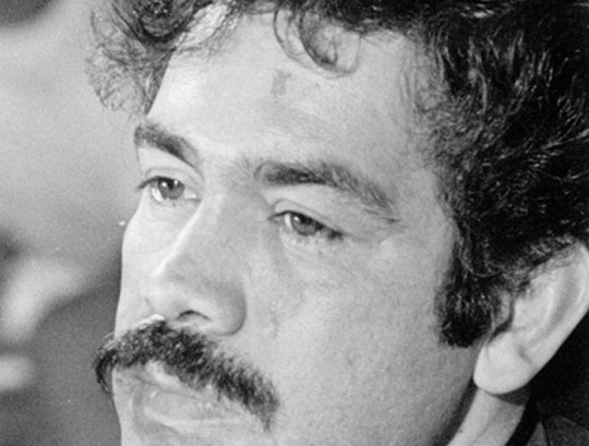 Rodolfo "Corky" Gonzales sits contemplating