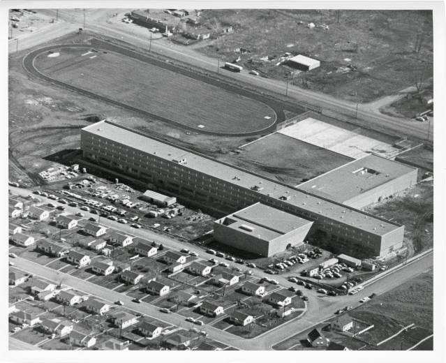 An aerial photograph of Lincoln High School.  The school track and the surrounding neighborhood are visible in the photograph.