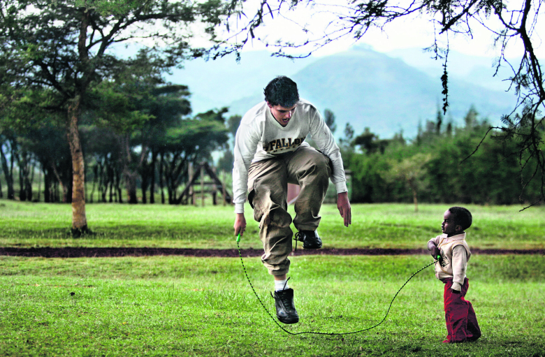With a little help from a little friend: Six-foot-tall Mullen High School senior Abe Ritter, 17, skips ropes with 4-year-old Abenezer, an orphan living at the Project Mercy compound. A year ago, Abenezer was brought to the compound on the verge of death due to an intestinal blockage and became the first surgical patient of Project Mercy's new hospital. Today, he is a vibrant member of the community and a favorite of compound residents and American visitors alike.