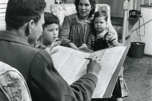 Census enumerator visiting a Virginia household during the 1950 U.S. Census. Image courtesy of the National Archives.
