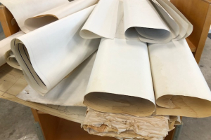 Rolled and damaged paper