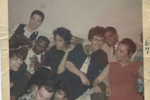 Photograph of Robert and Janice Ivery with friends during a party for her nursing class.