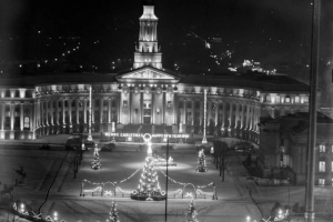 The Denver City and County Building is decorated for Christmas, Denver, Colorado. Sign reads: "Merry Christmas Happy New Year 1940."