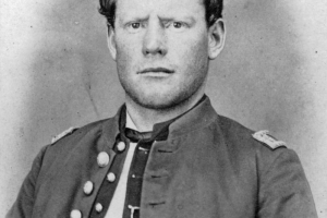 Studio portrait of Silas S. Soule. He wears a military uniform from the Civil War era.
