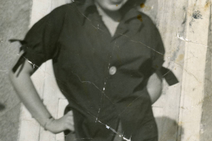 Portrait of Magdalena Gallegos as a young woman, the local historian and author poses with her hands on her hips in the Auraria neighborhood, Denver, Colorado.