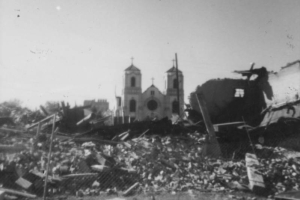 View of St. Cajetan's Catholic Church (now St. Cajetan's Center), 1190 9th (Ninth) Street in the Auraria neighborhood, Denver, Colorado.  The church is surrounded by rubble, the remains of buildings destroyed for the Auraria Higher Education Center campus.