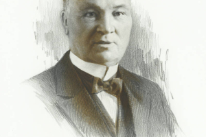 Portrait of John Kernan Mullen, Denver, Colorado business man and philanthropist, in a tuxedo and black tie.