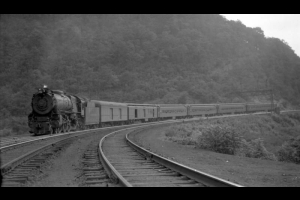 Passenger train on Horse Shoe curve; 6 cars, 10 MPH.               Photographed: near Altoona, Pa., August 19, 1933.