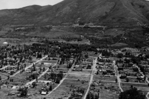 Panoramic view of the town of Aspen, Colorado, situated at the foot of Smuggler Mountain in Pitkin County.  Landmarks include Pitkin County Courthouse, Wheeler Opera House, and Hotel Jerome.