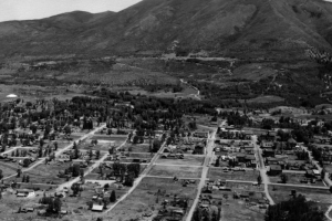 Panoramic view of the town of Aspen, Colorado, situated at the foot of Smuggler Mountain in Pitkin County.  Landmarks include Pitkin County Courthouse, Wheeler Opera House, and Hotel Jerome.